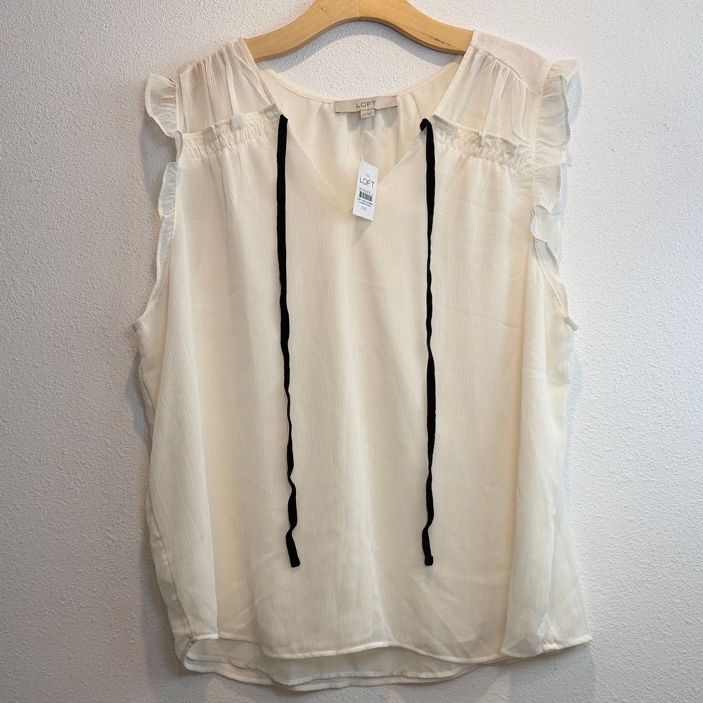 LOFT Cream Sleeveless Blouse with Ruffled sleeves and black velvet string tie.